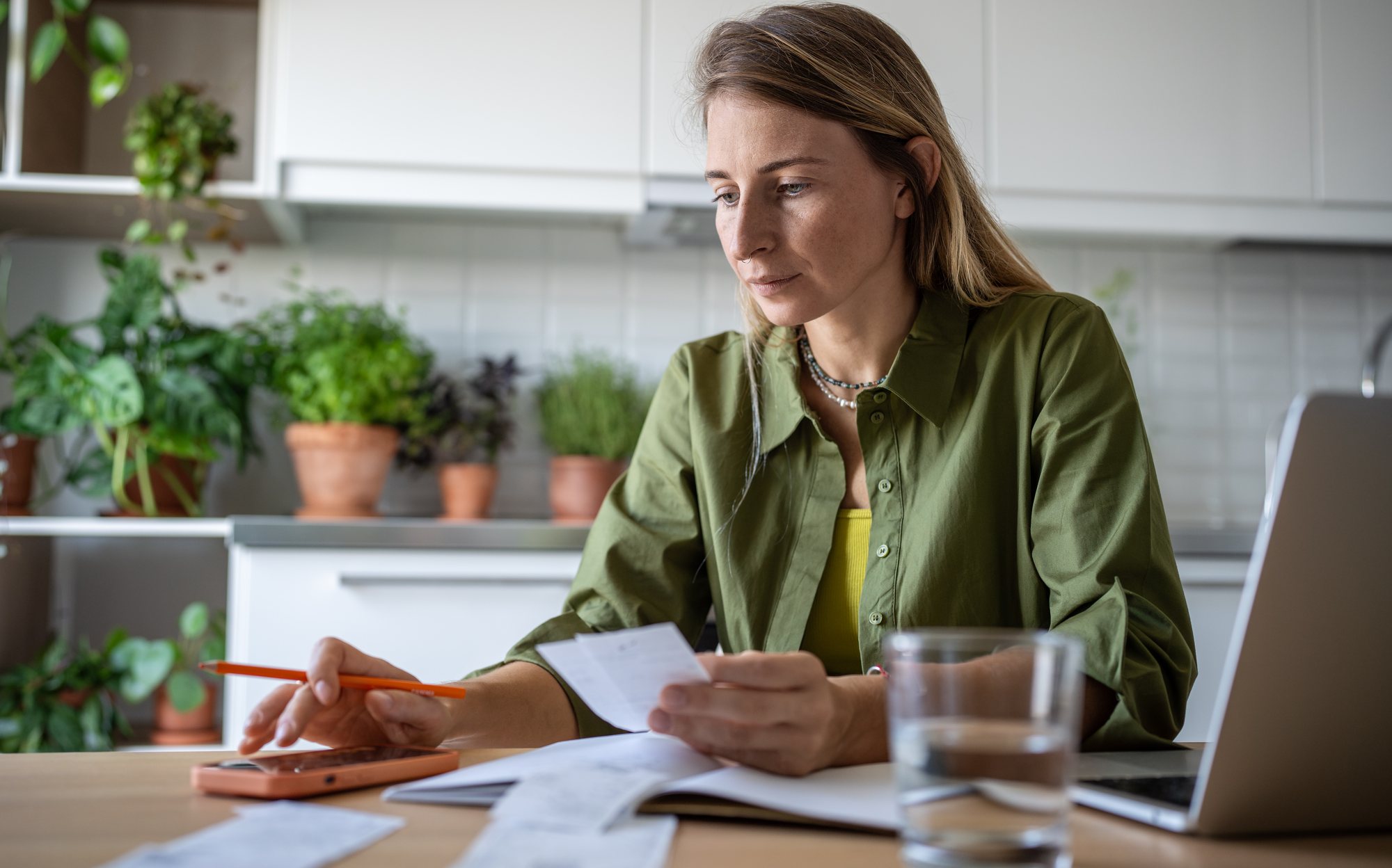 A freelancer gathering her tax paperwork at home before asking for a quote